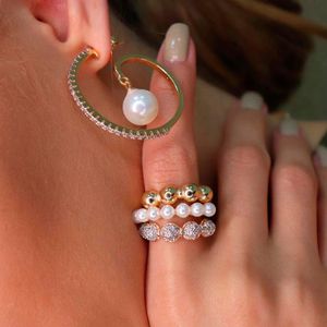 Anel em Banho de Ouro 18k Triplo Bolas com Zircônias - PL0286